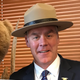 Even the bear is bothered by the hat being worn inappropriately.